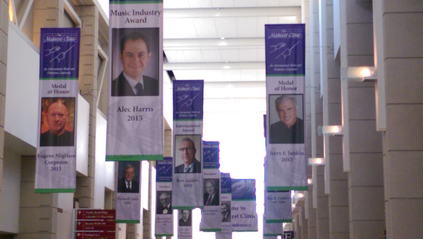 A series of banners with photographs.