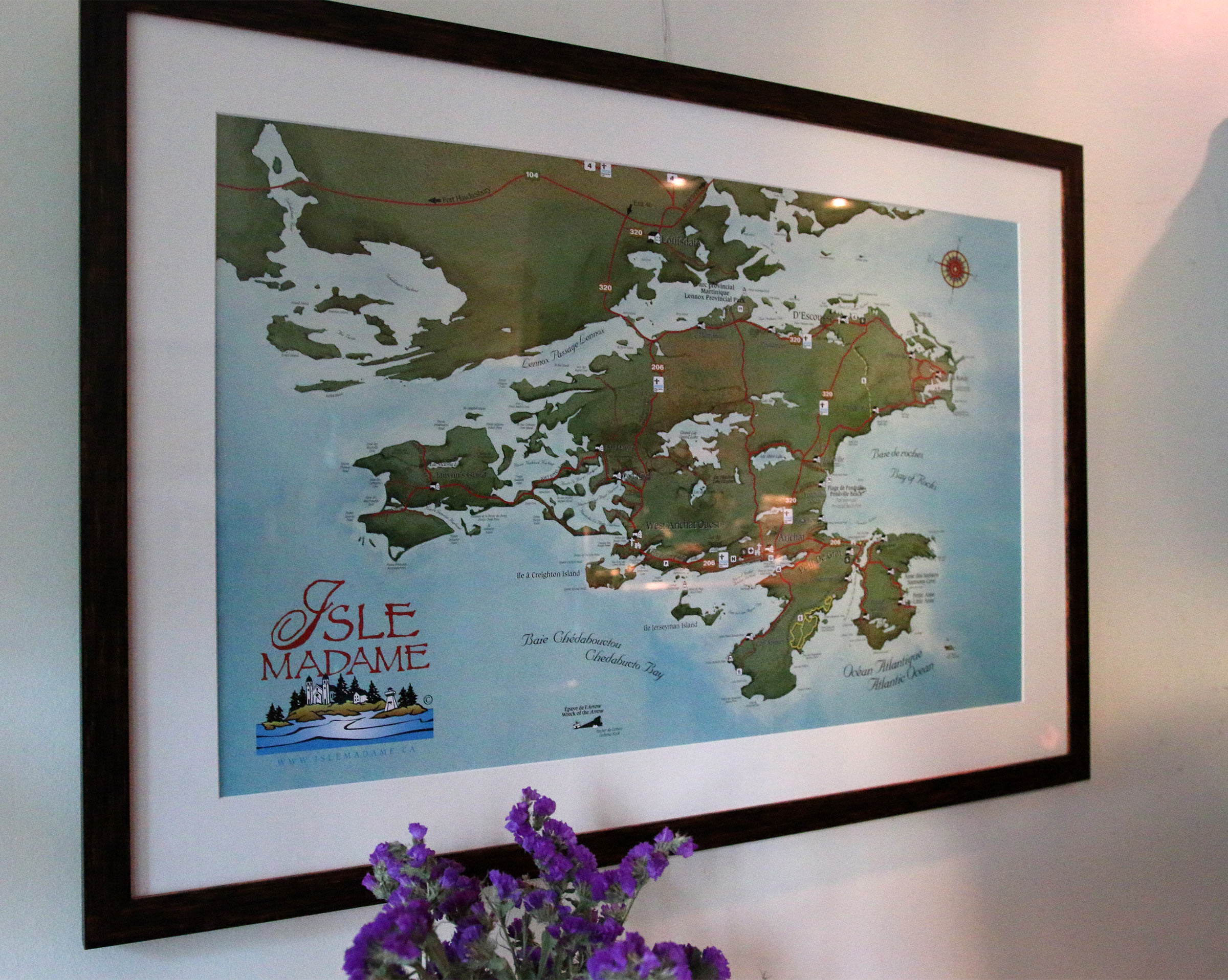 A framed map of Cape Breton Island.