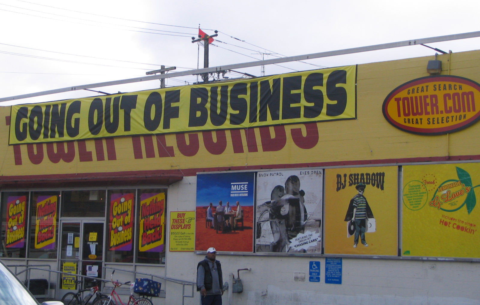 The last days of the San Francisco branch of Tower Records showing the Twoer Records logo on the storefront covered with a 