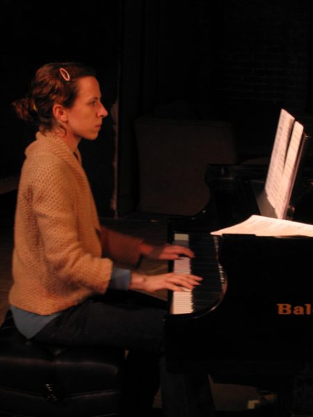 Missy Mazzoli performing on a grand piano at the 2006 MATA Festival.