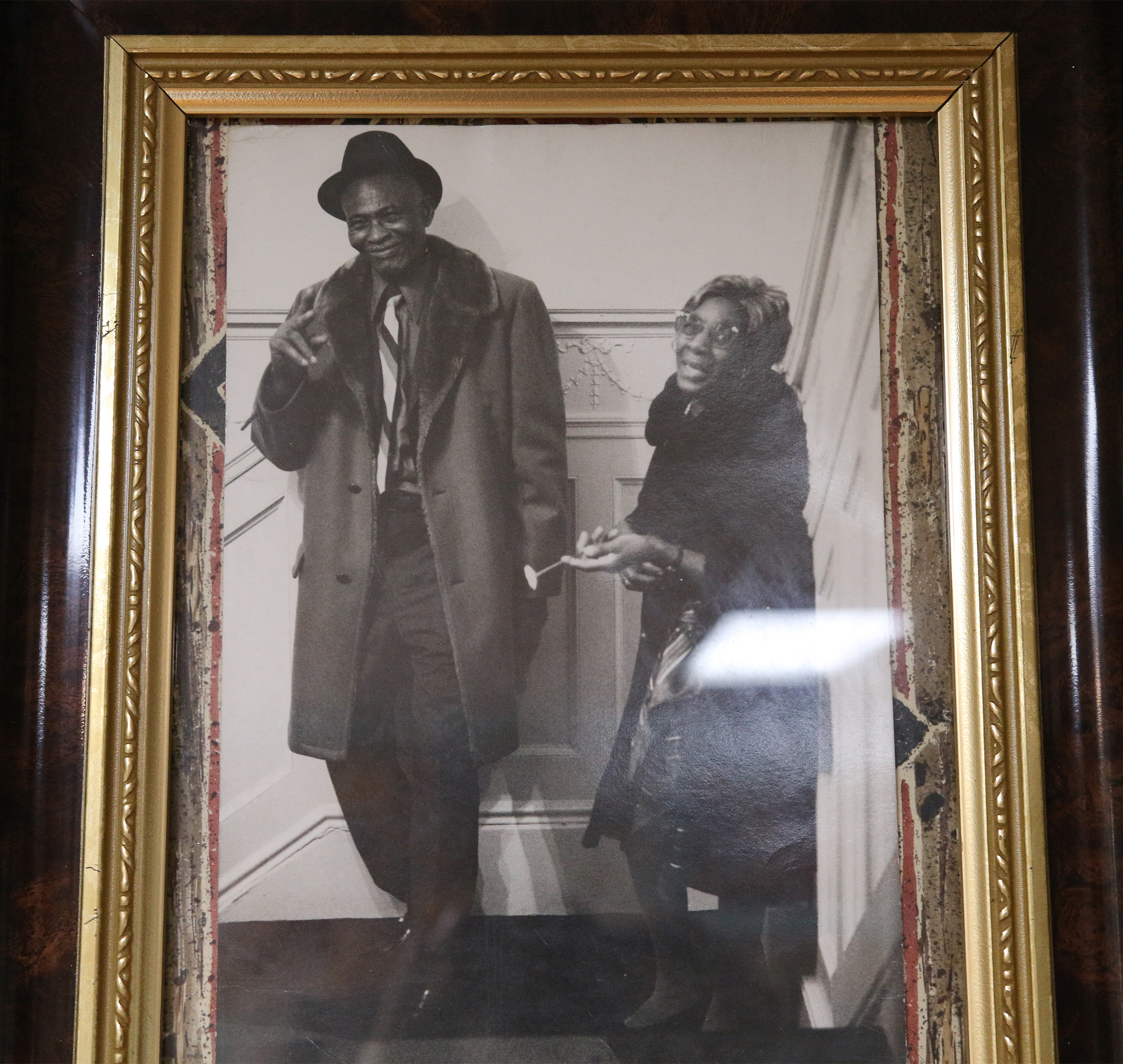 A framed photo of Randy Weston's parents