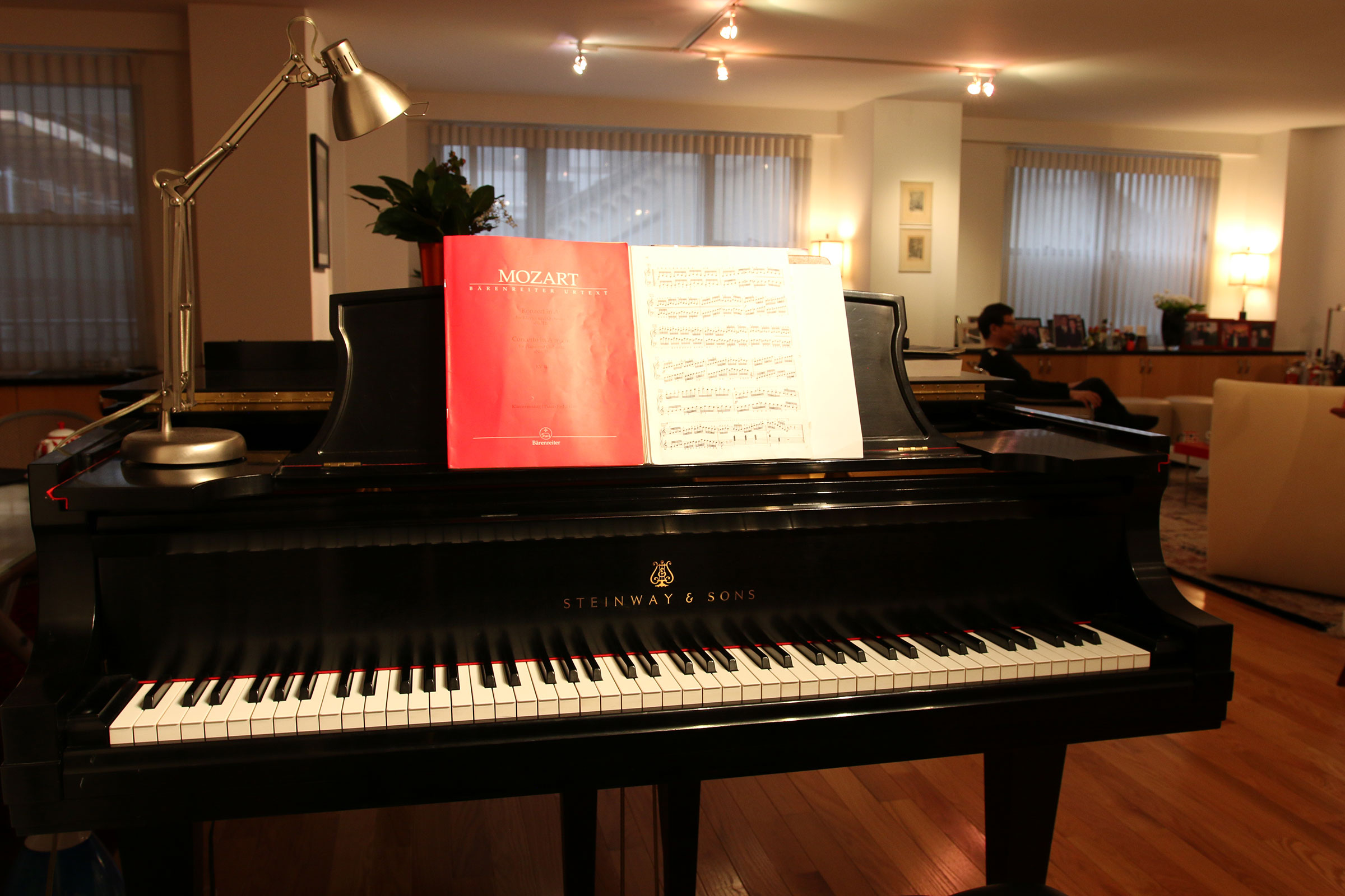 A Mozart piano music score sits on Bright Sheng's grand piano.