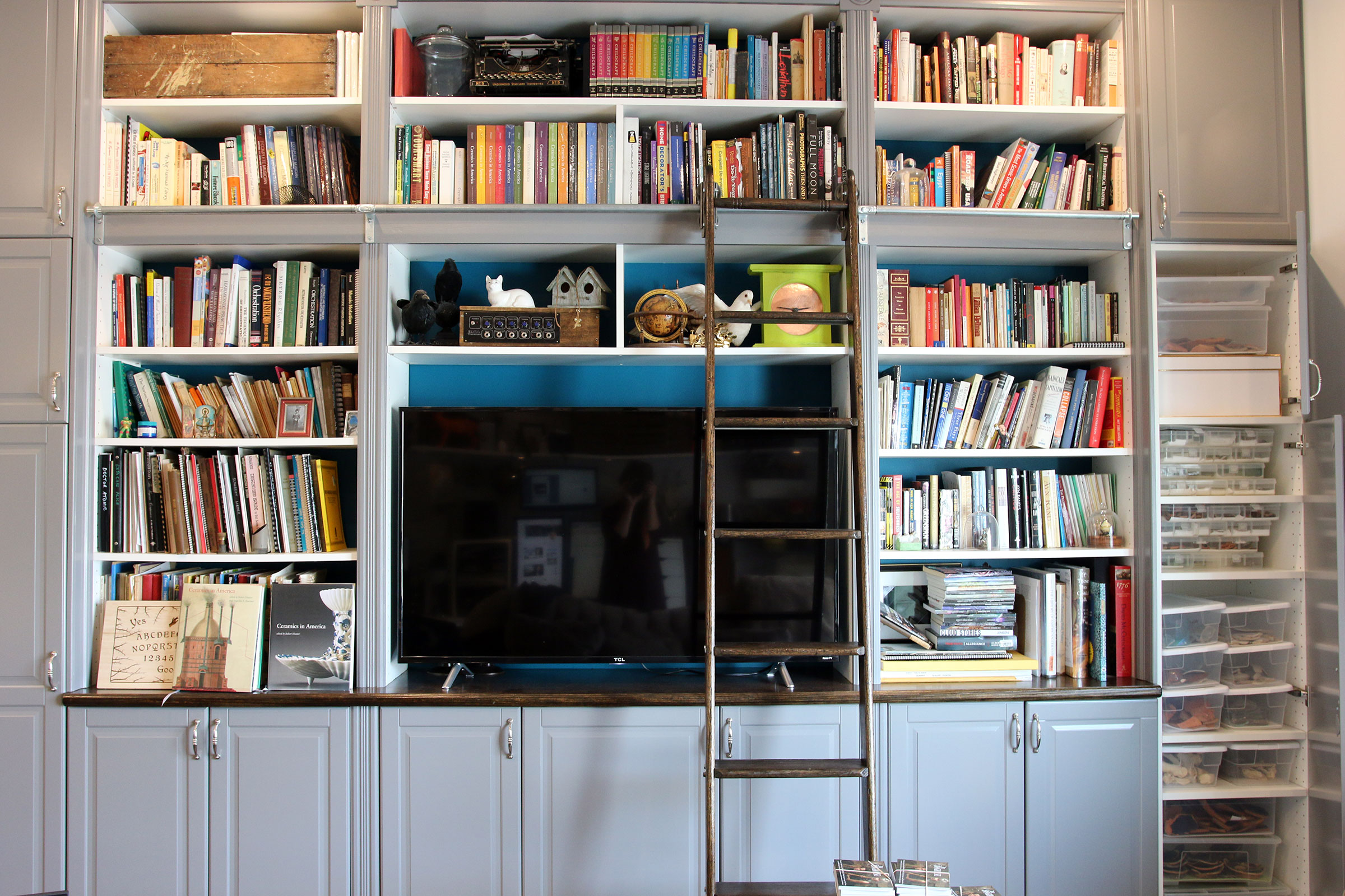 One of Melissa Dunphy's bookshelves with a stepladder.