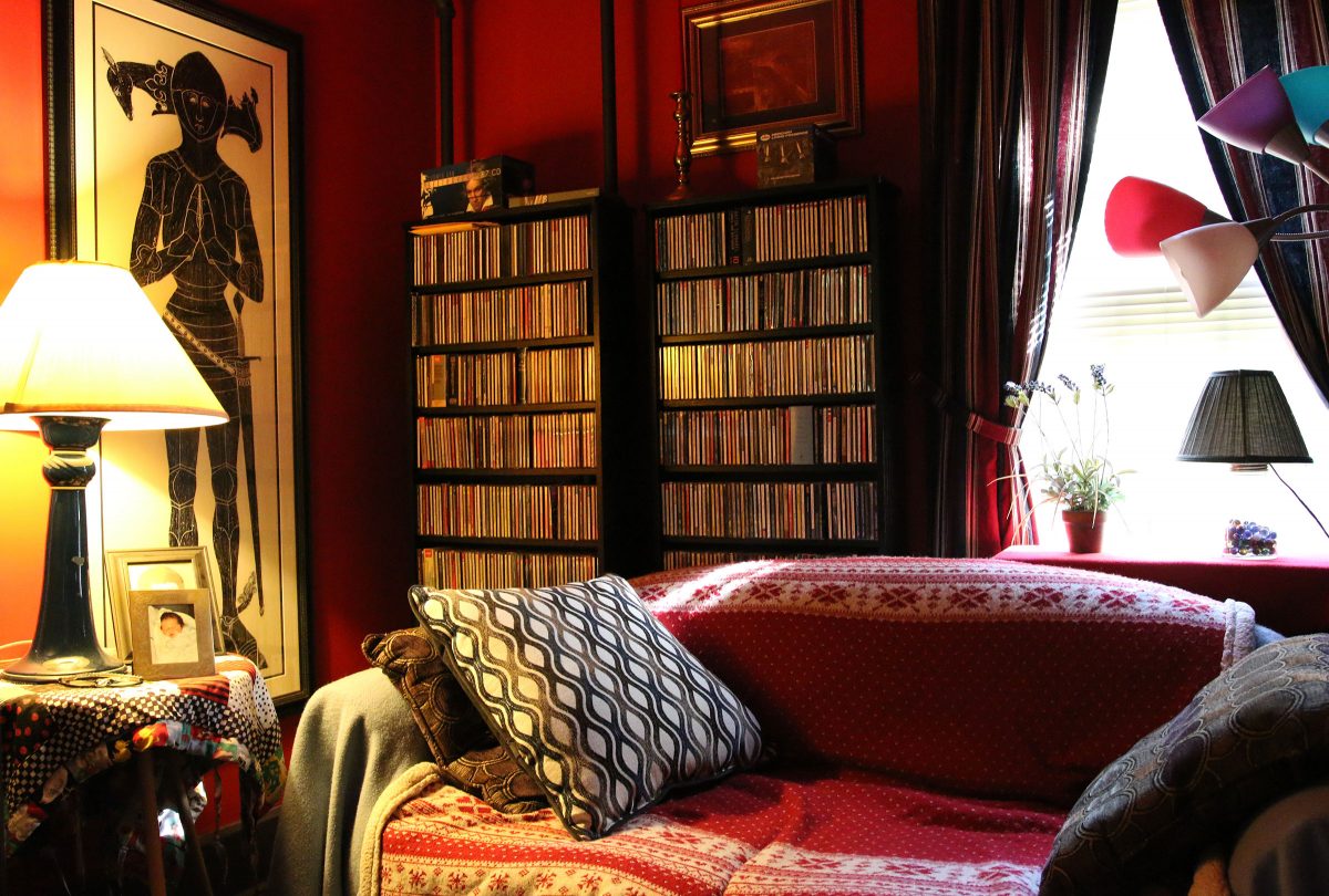 Lamps, a couch and CD shelves in Juliana Hall's living room.