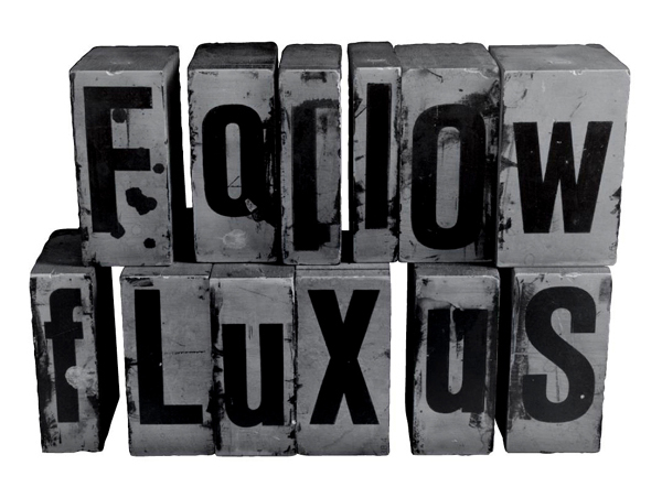 The logo for Follow Fluxus is a series of boxes which each have printed on them one letter: 